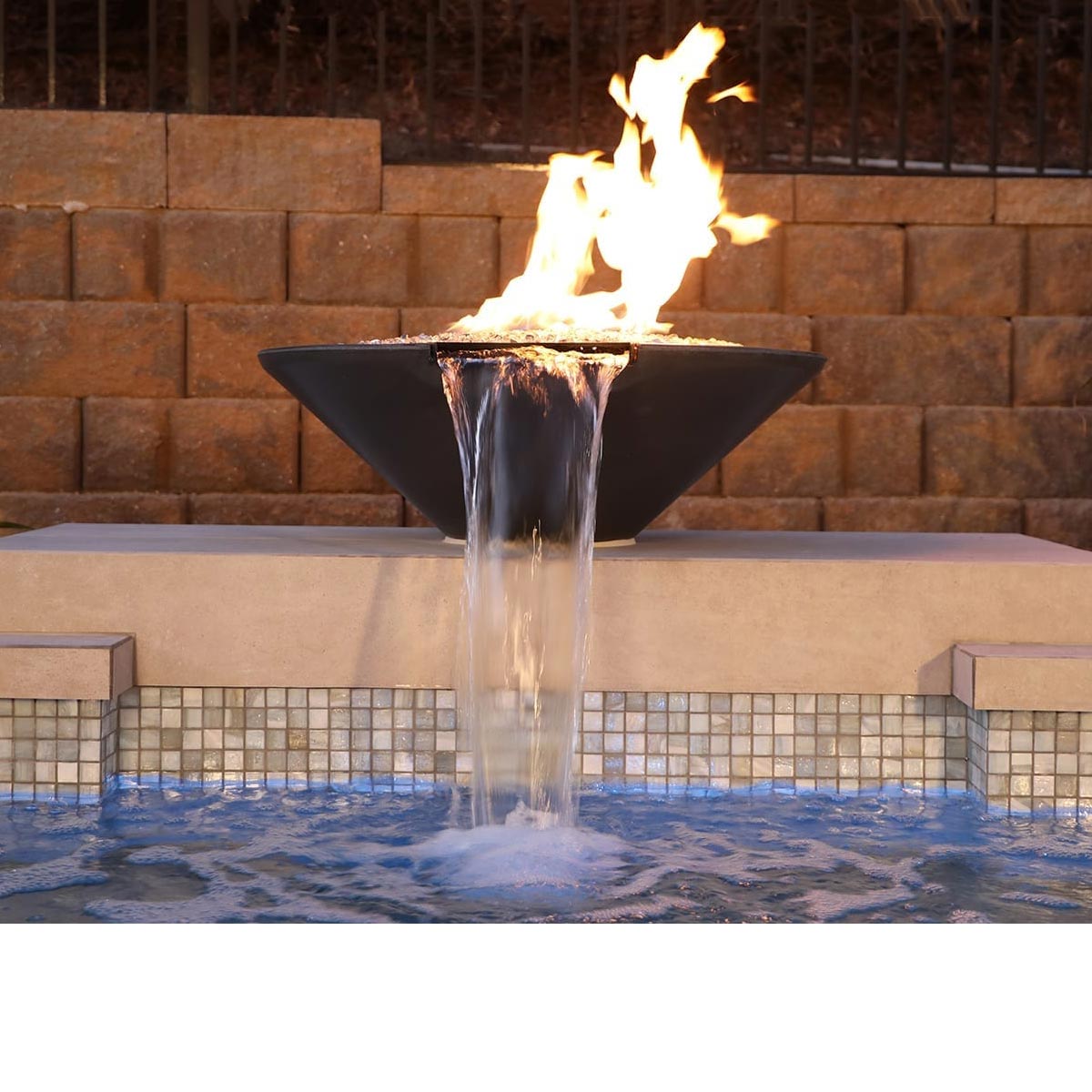 Geo Round Fire And Water Bowl (material: Gfrc) water/fire feature that is plumbed with a lip so water can be pumped from underneath and spill into a basin. the fire feature runs on liquid propane or natural gas.